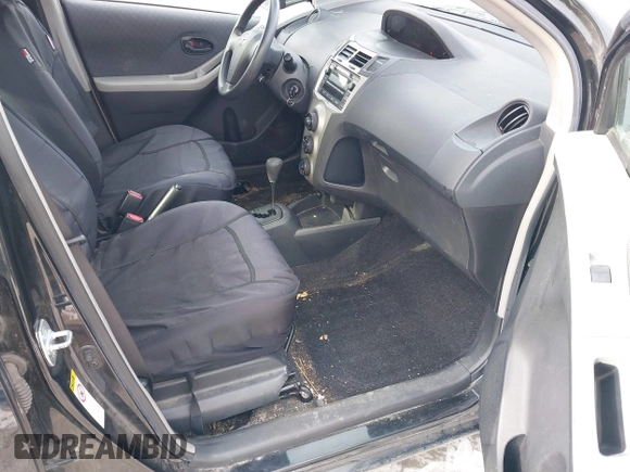 2010 Toyota Yaris with VIN JTDKT4K35A5280923, listed as a IAAI auction lot 41270556 with 175,643 mi miles. Bid and sale history available at carsss.com. Image 5.