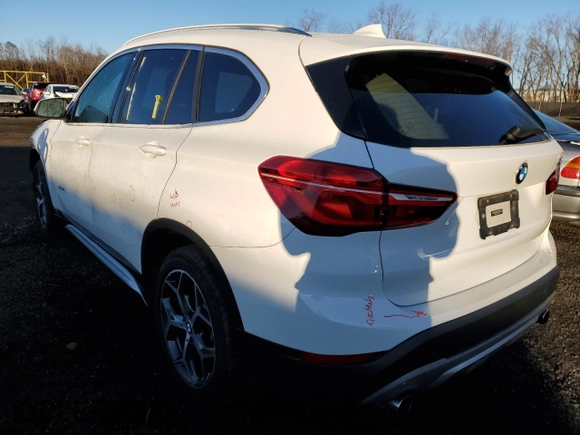 2017 BMW X1 xDrive28i with VIN WBXHT3C39H5F84369, listed as a Copart auction lot 68940992 with 92,054 mi miles. Bid and sale history available at carsss.com. Image 2.