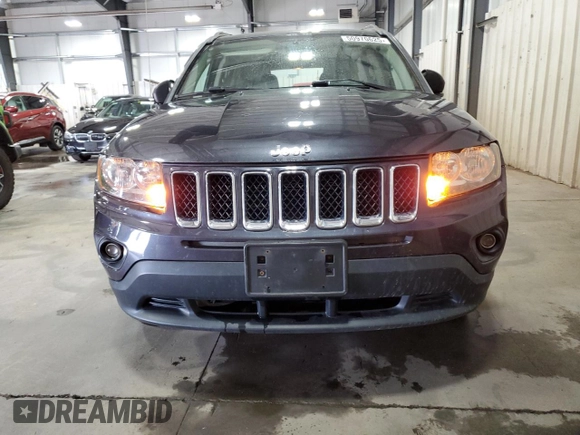 2014 Jeep Compass Sport with VIN 1C4NJDBB3ED793061, listed as a Copart auction lot 50970625 with 146,113 mi miles and Salvage Title. Bid and sale history available at carsss.com. Image 5.