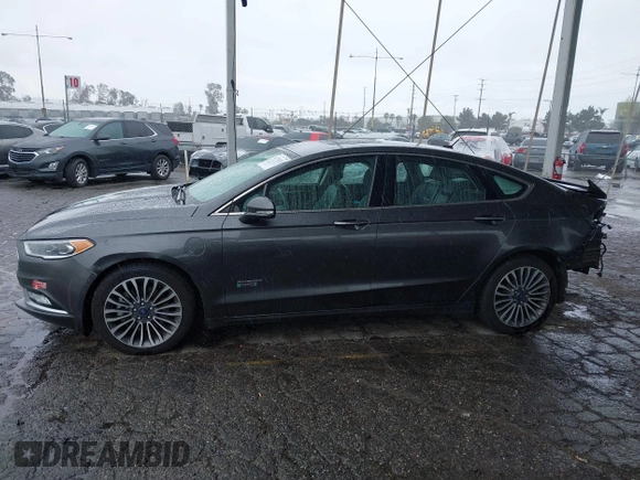 2017 Ford Fusion Titanium with VIN 3FA6P0SU8HR329570, listed as a IAAI auction lot 41773023 with 112,022 mi miles and . Bid and sale history available at DreamBid. Image 15.