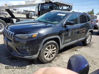 2019 Jeep Cherokee Latitude z VIN 1C4PJMCB0KD124765, wystawiony jako Copart lot #59771225 z przebiegiem 147 815 mil mil oraz Szkoda całkowita • Salvage title. Historia ofert i sprzedaży dostępna na DreamBid. Obrazek 1.