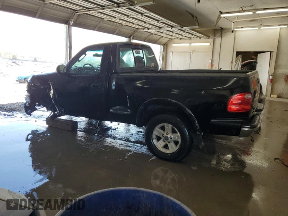 2003 Ford F-150 with VIN 2FTRF08L03CA03160, listed as a Copart auction lot 51591535 with 220,630 mi miles and Salvage title. Bid and sale history available at DreamBid. Image 2.