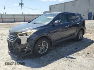2018 Hyundai Santa Fe 2.4L z VIN 5NMZT3LB0JH083864, wystawiony jako Copart lot #60912695 z przebiegiem 138 427 mil mil oraz Szkoda całkowita • Salvage title. Historia ofert i sprzedaży dostępna na DreamBid. Obrazek 1.