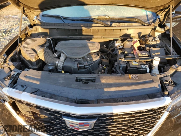 2023 Cadillac XT6 FWD Premium Luxury z VIN 1GYKPCRS7PZ105628, wystawiony jako Copart lot #84841124 z przebiegiem Nie podano mil oraz Szkoda całkowita • Salvage title. Historia ofert i sprzedaży dostępna na DreamBid. Obrazek 12.