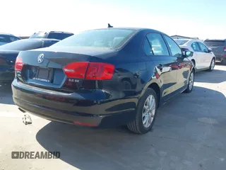 2012 Volkswagen Jetta Sedan SE w/Convenience PZEV with VIN 3VWDP7AJ1CM339992, listed as a IAAI auction lot 41632040 with 95,461 mi miles. Bid and sale history available at carsss.com. Image 4.