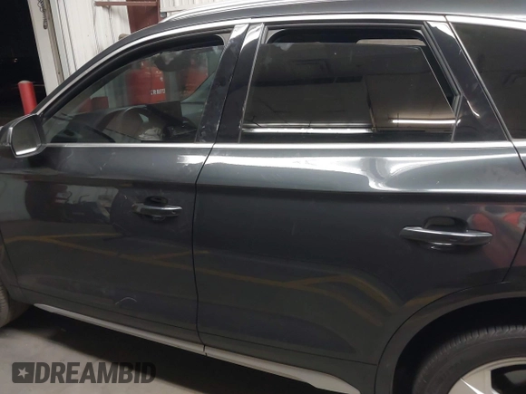 2021 Audi Q5 Premium Plus z VIN WA1BAAFY6M2130300, wystawiony jako IAAI lot #42250661 z przebiegiem 49 147 mil mil oraz . Historia ofert i sprzedaży dostępna na DreamBid. Obrazek 14.