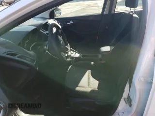 2017 Ford Focus SE with VIN 1FADP3F28HL309268, listed as a Copart auction lot 57995985 with 99,277 mi miles and Salvage title. Bid and sale history available at DreamBid. Image 7.