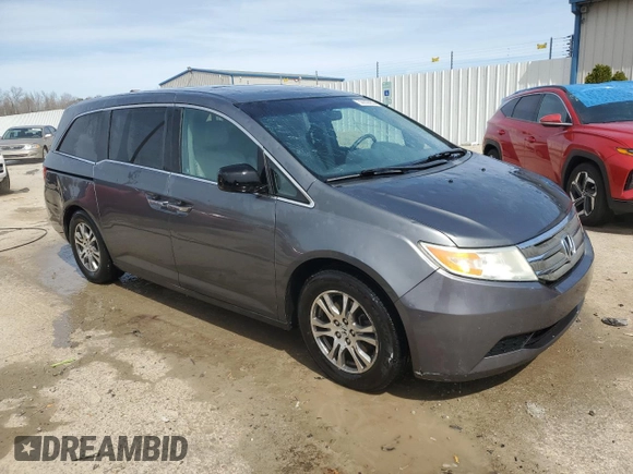 2012 Honda Odyssey EX-L with VIN 5FNRL5H61CB067331, listed as a Copart auction lot 50016455 with 156,020 mi miles and Non Repairable. Bid and sale history available at DreamBid. Image 4.