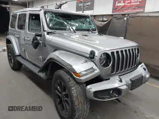 2021 Jeep Wrangler Unlimited Sahara z VIN 1C4HJXEN1MW529568, wystawiony jako IAAI lot #42336590 z przebiegiem 39 931 mil mil oraz . Historia ofert i sprzedaży dostępna na DreamBid. Obrazek 1.