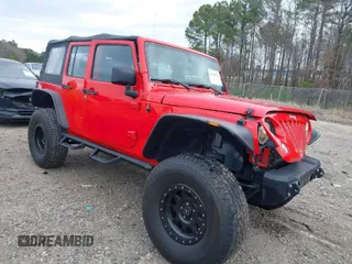 2015 Jeep Wrangler Unlimited Willys Wheeler with VIN 1C4BJWDGXFL610818, listed as a IAAI auction lot 41761332 with 138,147 mi miles and . Bid and sale history available at DreamBid. Image 1.