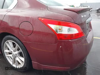 2010 Nissan Maxima 3.5 SV with VIN 1N4AA5AP7AC809317, listed as a IAAI auction lot 42095436 with 144,556 mi miles. Bid and sale history available at carsss.com. Image 13.