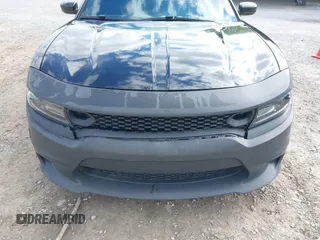 2018 Dodge Charger SXT Plus with VIN 2C3CDXHG1JH139311, listed as a IAAI auction lot 41758392 with 103,034 mi miles and . Bid and sale history available at carsss.com. Image 6.