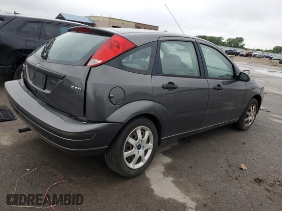 2005 Ford Focus S with VIN 3FAFP37N75R120187, listed as a Copart auction lot 57390605 with 163,547 mi miles and Salvage title. Bid and sale history available at DreamBid. Image 3.