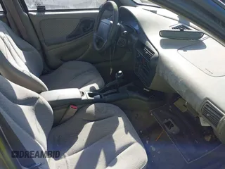 1998 Chevrolet Cavalier z VIN 1G1JC524XW7135102, wystawiony jako IAAI lot #40811285 z przebiegiem 66 909 mil mil oraz . Historia ofert i sprzedaży dostępna na DreamBid. Obrazek 5.