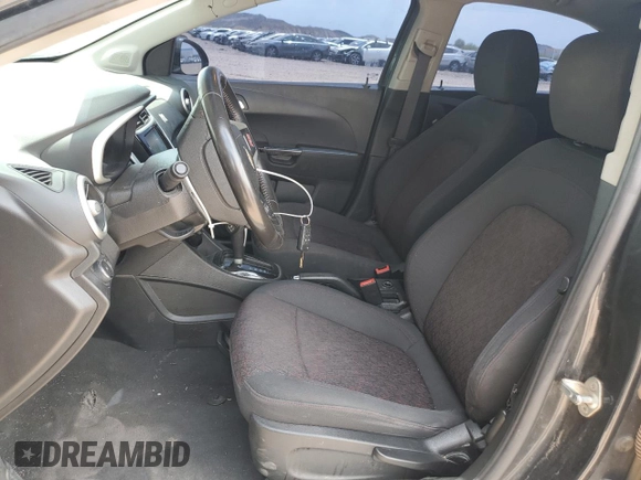 2017 Chevrolet Sonic LT with VIN 1G1JD5SG1H4103649, listed as a Copart auction lot 58536765 with 128,562 mi miles and Salvage title. Bid and sale history available at DreamBid. Image 7.
