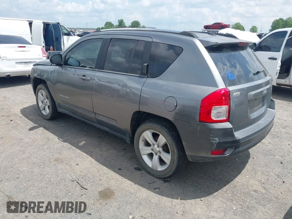 2011 Jeep Compass Latitude with VIN 1J4NT1FB4BD246549, listed as a IAAI auction lot 42156761 with 232,739 mi miles. Bid and sale history available at carsss.com. Image 3.