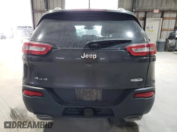 2015 Jeep Cherokee Latitude with VIN 1C4PJMCS7FW504728, listed as a Copart auction lot 81674984 with 144,342 mi miles and Salvage Title. Bid and sale history available at carsss.com. Image 6.