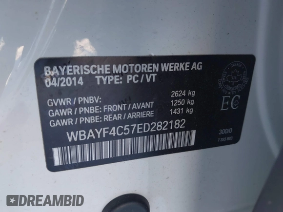 2014 BMW 7 Series 740Li xDrive with VIN WBAYF4C57ED282182, listed as a IAAI auction lot 41324877 with 102,699 mi miles. Bid and sale history available at carsss.com. Image 9.