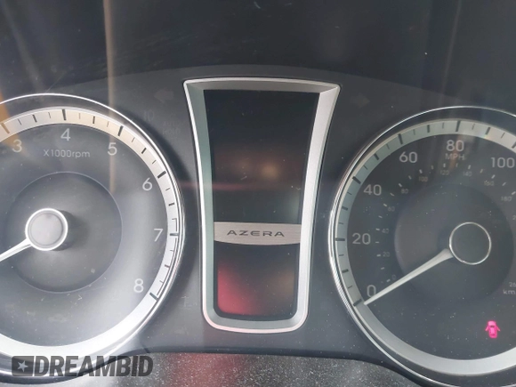 2013 Hyundai Azera z VIN KMHFH4JG8DA329143, wystawiony jako IAAI lot #41933036 z przebiegiem Nie podano mil oraz . Historia ofert i sprzedaży dostępna na DreamBid. Obrazek 7.