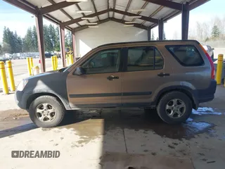 2002 Honda CR-V LX z VIN JHLRD78512C007757, wystawiony jako IAAI lot #41885302 z przebiegiem 177 892 mil mil oraz . Historia ofert i sprzedaży dostępna na DreamBid. Obrazek 14.