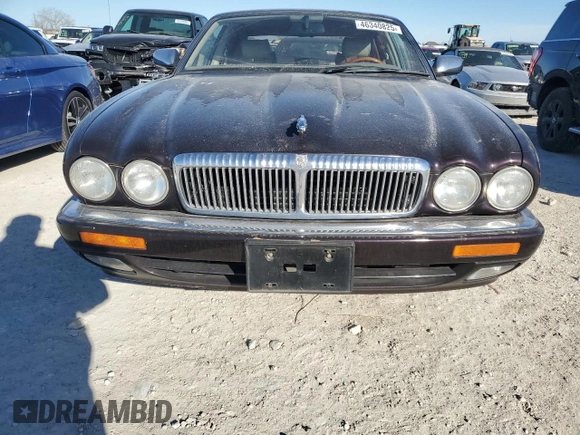 1995 Jaguar XJ with VIN SAJKX1743SC734007, listed as a Copart auction lot 46340825 with 130,115 mi miles and Salvage Title. Bid and sale history available at DreamBid. Image 5.