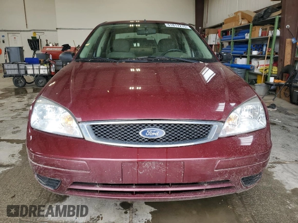 2007 Ford Focus S z VIN 1FAFP34N77W249390, wystawiony jako Copart lot #61817215 z przebiegiem 112 295 mil mil oraz Szkoda całkowita • Salvage title. Historia ofert i sprzedaży dostępna na DreamBid. Obrazek 5.