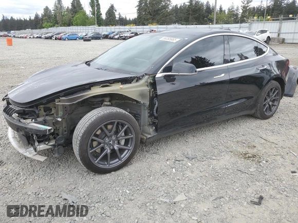2019 Tesla Model 3 Mid Range z VIN 5YJ3E1EAXKF422500, wystawiony jako Copart lot #56065665 z przebiegiem 72 781 mil mil oraz Szkoda całkowita • Salvage title. Historia ofert i sprzedaży dostępna na DreamBid. Obrazek 1.