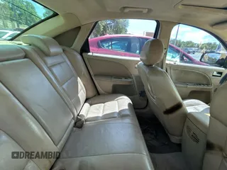 2005 Ford Five Hundred SEL z VIN 1FAFP24185G146669, wystawiony jako Copart lot #51990845 z przebiegiem Nie podano mil oraz Czysty tytuł • Clean title. Historia ofert i sprzedaży dostępna na DreamBid. Obrazek 6.