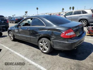 2009 Mercedes-Benz CLK 350 with VIN WDBTJ56H39F268702, listed as a Copart auction lot 68367854 with 144,115 mi miles and Salvage Title. Bid and sale history available at carsss.com. Image 2.