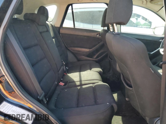 2016 Mazda CX-5 Touring z VIN JM3KE2CY5G0617516, wystawiony jako Copart lot #56421005 z przebiegiem 110 739 mil mil oraz Szkoda całkowita • Salvage title. Historia ofert i sprzedaży dostępna na DreamBid. Obrazek 11.