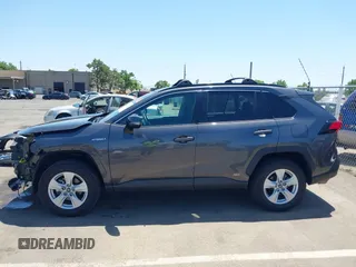 2019 Toyota RAV4 Hybrid LE with VIN 2T3MWRFV7KW006027, listed as a IAAI auction lot 42397600 with 67,205 mi miles and . Bid and sale history available at DreamBid. Image 15.