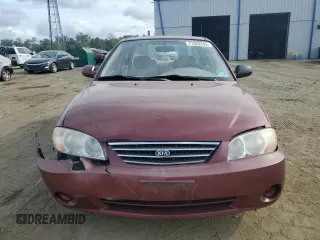 2003 Kia Spectra with VIN KNAFB121935241589, listed as a Copart auction lot 71933194 with 61,738 mi miles and Salvage Title. Bid and sale history available at DreamBid. Image 5.