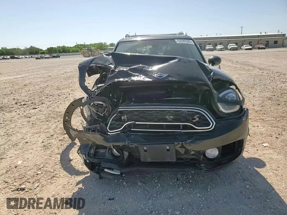 2017 MINI Countryman Cooper S z VIN WMZYT3C35H3D97994, wystawiony jako Copart lot #52289385 z przebiegiem 80 781 mil mil oraz Szkoda całkowita • Salvage title. Historia ofert i sprzedaży dostępna na DreamBid. Obrazek 10.