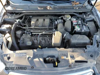 2015 Ford Taurus SE with VIN 1FAHP2D81FG127498, listed as a Copart auction lot 41496845 with 208,790 mi miles and Salvage Title. Bid and sale history available at DreamBid. Image 11.