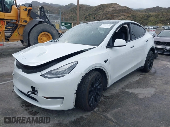 2020 Tesla Model Y Long Range with VIN 5YJYGDEE2LF022484, listed as a IAAI auction lot 41798662 with 108,978 mi miles and . Bid and sale history available at DreamBid. Image 19.