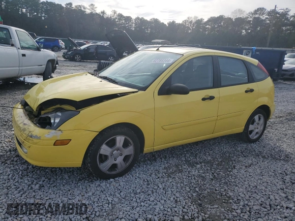 2004 Ford Focus ZX5 z VIN 3FAFP37344R117096, wystawiony jako Copart lot #82789344 z przebiegiem 188 029 mil mil oraz Szkoda całkowita • Salvage title. Historia ofert i sprzedaży dostępna na DreamBid. Obrazek 1.
