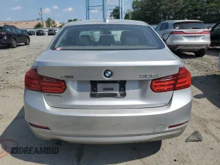 2013 BMW 3 Series 328i xDrive with VIN WBA3B5G56DNS00182, listed as a Copart auction lot 61920285 with Not provided miles and Salvage title. Bid and sale history available at DreamBid. Image 6.