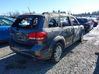 2015 Dodge Journey SXT with VIN 3C4PDDBG3FT755577, listed as a IAAI auction lot 41560150 with Not Provided miles and . Bid and sale history available at DreamBid. Image 4.