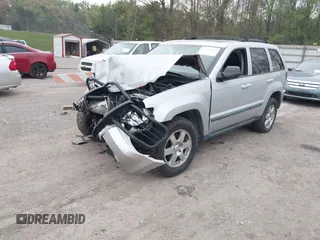 2009 Jeep Grand Cherokee Laredo with VIN 1J8GR48K09C557139, listed as a IAAI auction lot 41994604 with 1 mi miles. Bid and sale history available at carsss.com. Image 2.