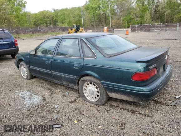 1995 Ford Taurus GL with VIN 1FALP52U8SA179395, listed as a Copart auction lot 53614265 with 71,082 mi miles and Salvage title. Bid and sale history available at DreamBid. Image 2.
