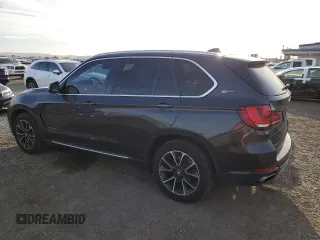 2018 BMW X5 xDrive40e iPerformance with VIN 5UXKT0C51J0W03594, listed as a Copart auction lot 47802005 with 59,670 mi miles and Salvage Title. Bid and sale history available at carsss.com. Image 2.