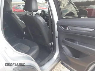 2020 Mazda CX-5 Touring with VIN JM3KFACM5L0768371, listed as a IAAI auction lot 41862623 with 138,446 mi miles and . Bid and sale history available at carsss.com. Image 8.