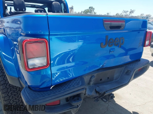 2022 Jeep Gladiator Texas Trail with VIN 1C6HJTAG4NL135346, listed as a IAAI auction lot 42824733 with 40,126 mi miles and . Bid and sale history available at DreamBid. Image 6.