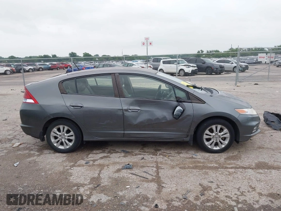2012 Honda Insight EX with VIN JHMZE2H79CS004299, listed as a IAAI auction lot 42296207 with 170,288 mi miles and . Bid and sale history available at DreamBid. Image 13.