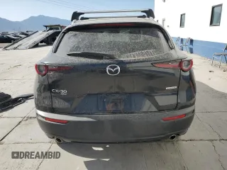 2023 Mazda CX-30 S Carbon Edition with VIN 3MVDMBCM6PM504431, listed as a Copart auction lot 61154795 with 90,396 mi miles and Salvage title. Bid and sale history available at DreamBid. Image 6.