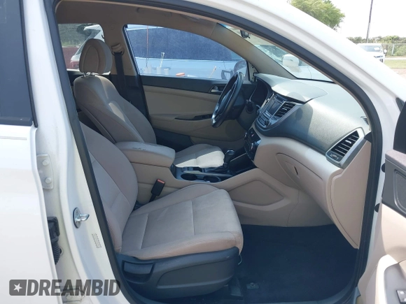 2016 Hyundai Tucson Limited with VIN KM8J33A2XGU030795, listed as a IAAI auction lot 42108969 with 117,418 mi miles. Bid and sale history available at carsss.com. Image 5.