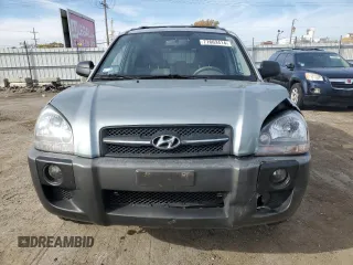 2009 Hyundai Tucson GLS with VIN KM8JM12B79U012399, listed as a Copart auction lot 77663414 with 164,615 mi miles and Salvage Title. Bid and sale history available at carsss.com. Image 5.