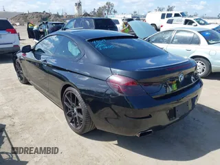 2013 BMW 6 Series 650i with VIN WBAYM9C57DDW20178, listed as a IAAI auction lot 41933561 with 72,886 mi miles and . Bid and sale history available at carsss.com. Image 3.