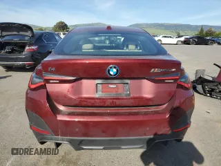 2022 BMW i4 eDrive40 with VIN WBY73AW05NFN05084, listed as a Copart auction lot 50677374 with 30,609 mi miles. Bid and sale history available at carsss.com. Image 6.