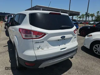 2014 Ford Escape SE z VIN 1FMCU0GX9EUE01742, wystawiony jako IAAI lot #42455907 z przebiegiem 95 843 mil mil oraz . Historia ofert i sprzedaży dostępna na DreamBid. Obrazek 1.